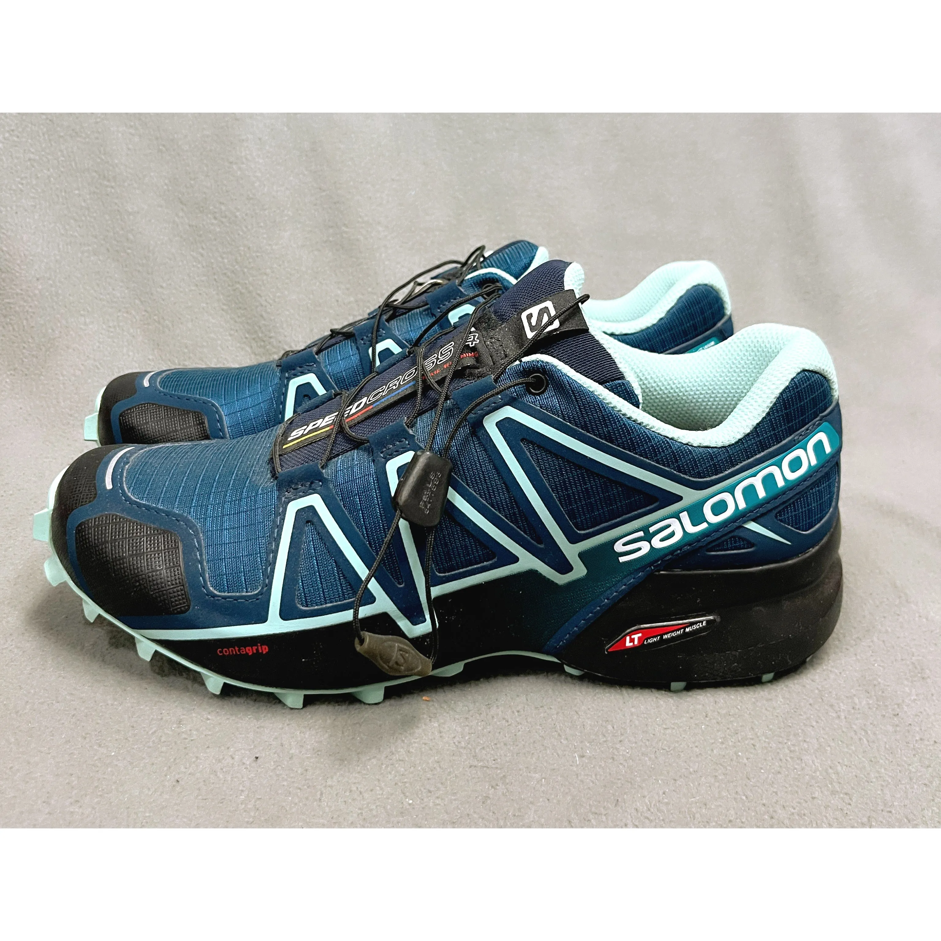 Salomon blue Speedcross trail running shoes, size 8.5, BRAND NEW!